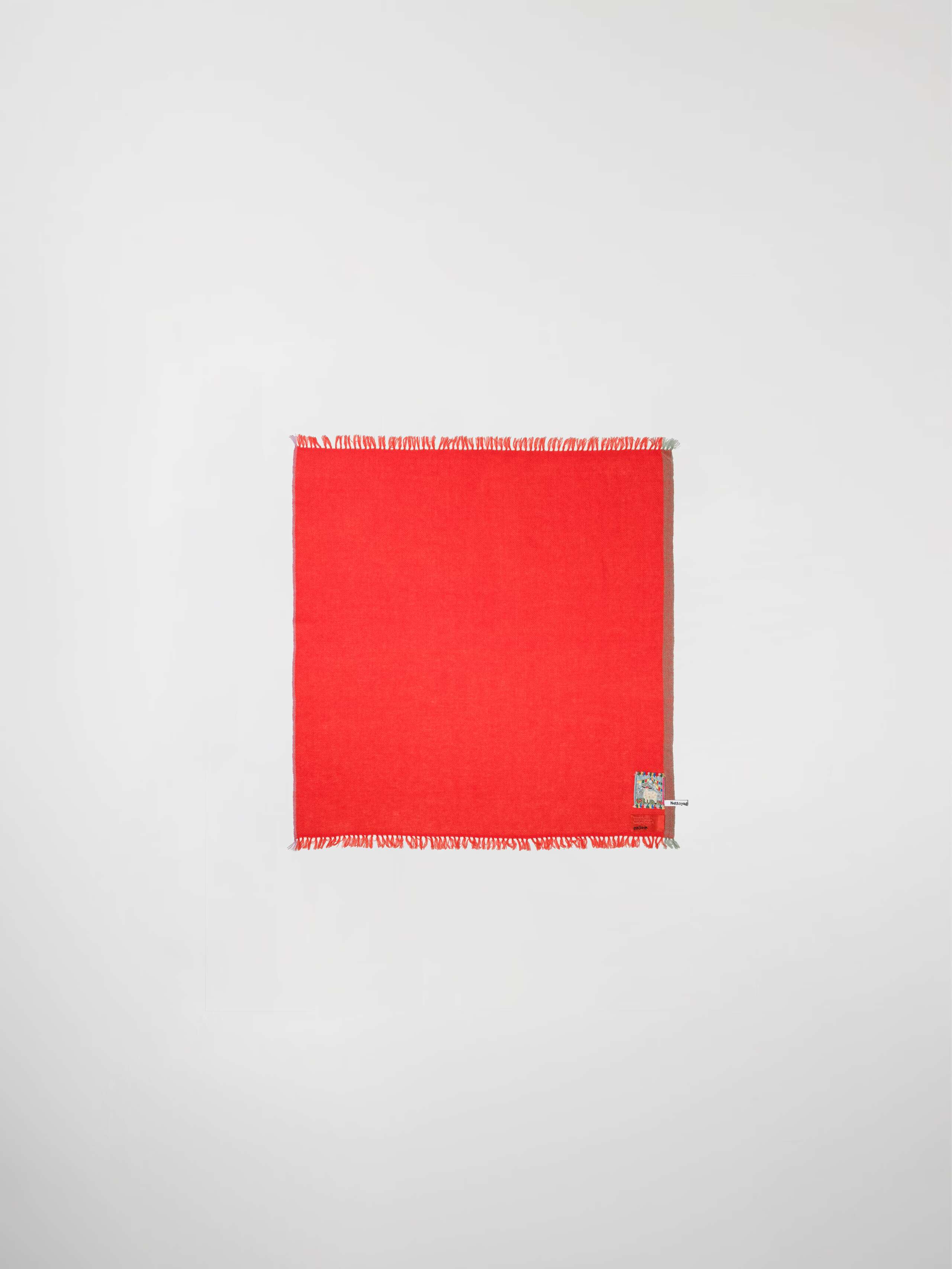 Picture of a cashmere stole in warm red