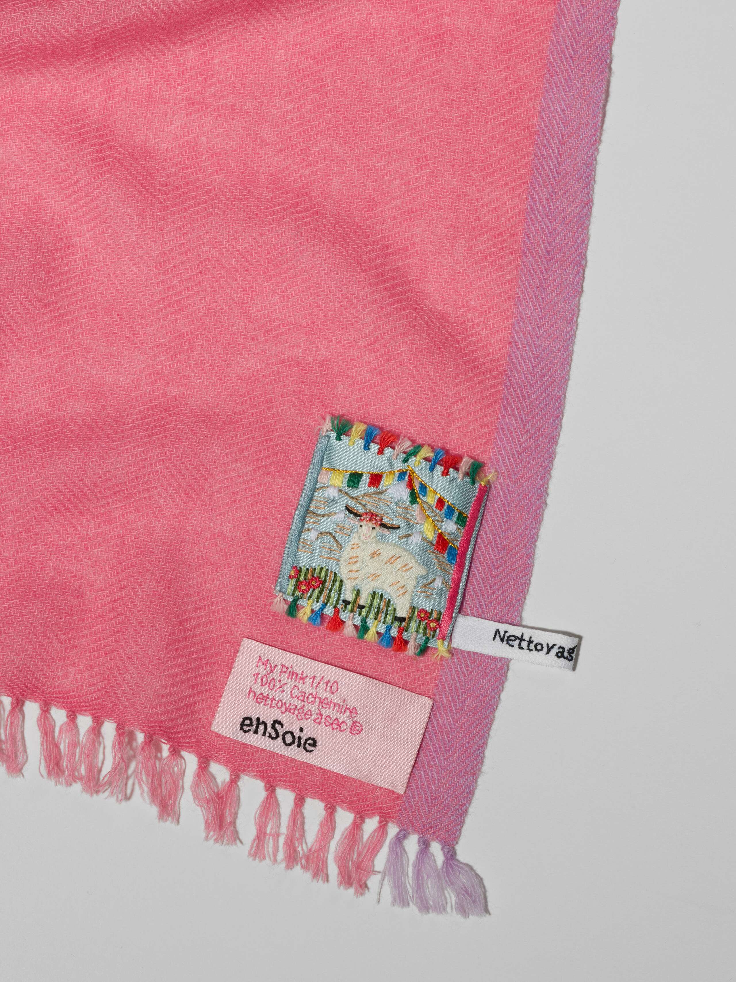 Detail Shot of Blia mini Stole in cashmere in a my pink shade