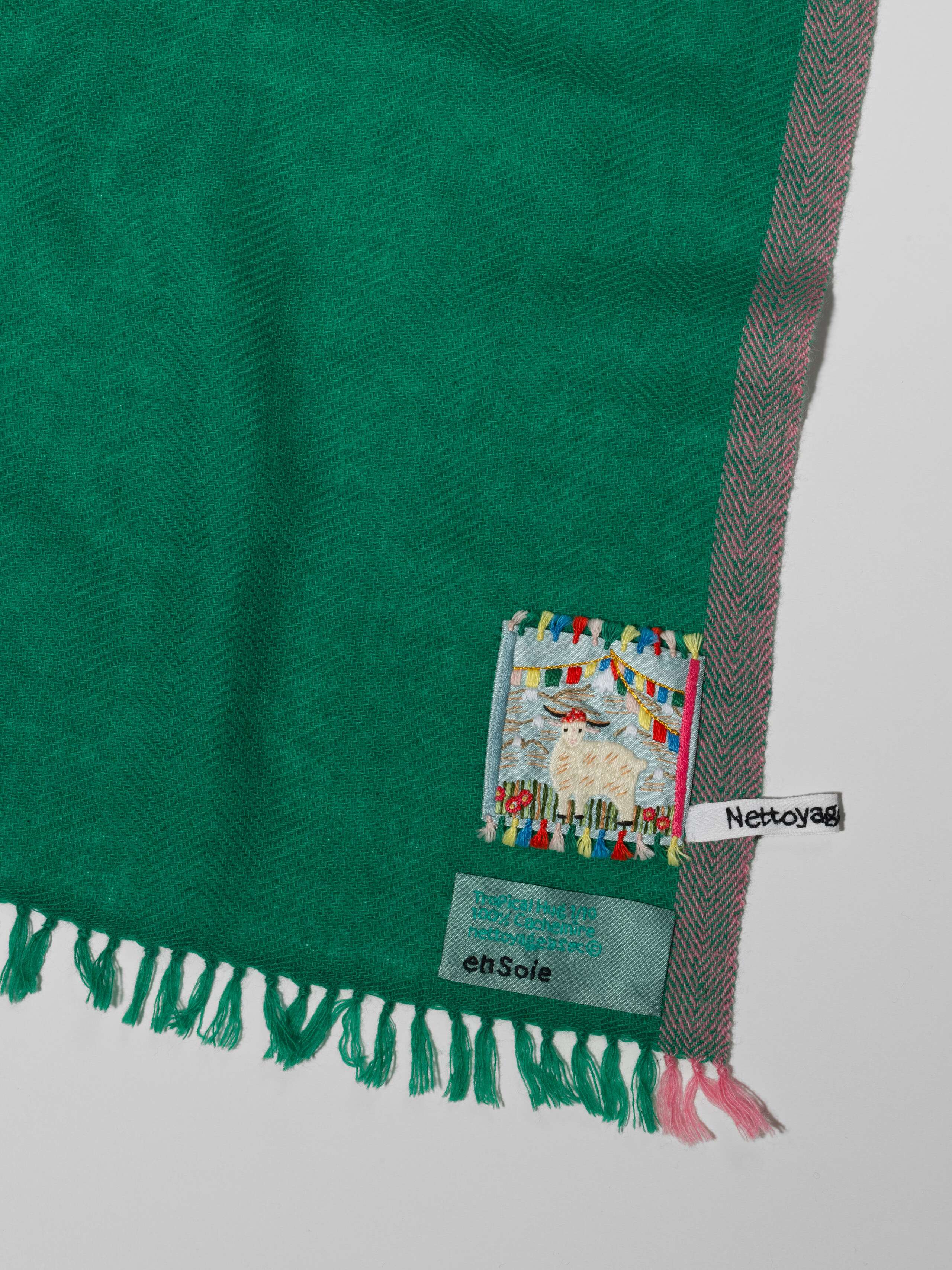 Detail Shot of Blia mini Stole in cashmere in a tropical hug green colour