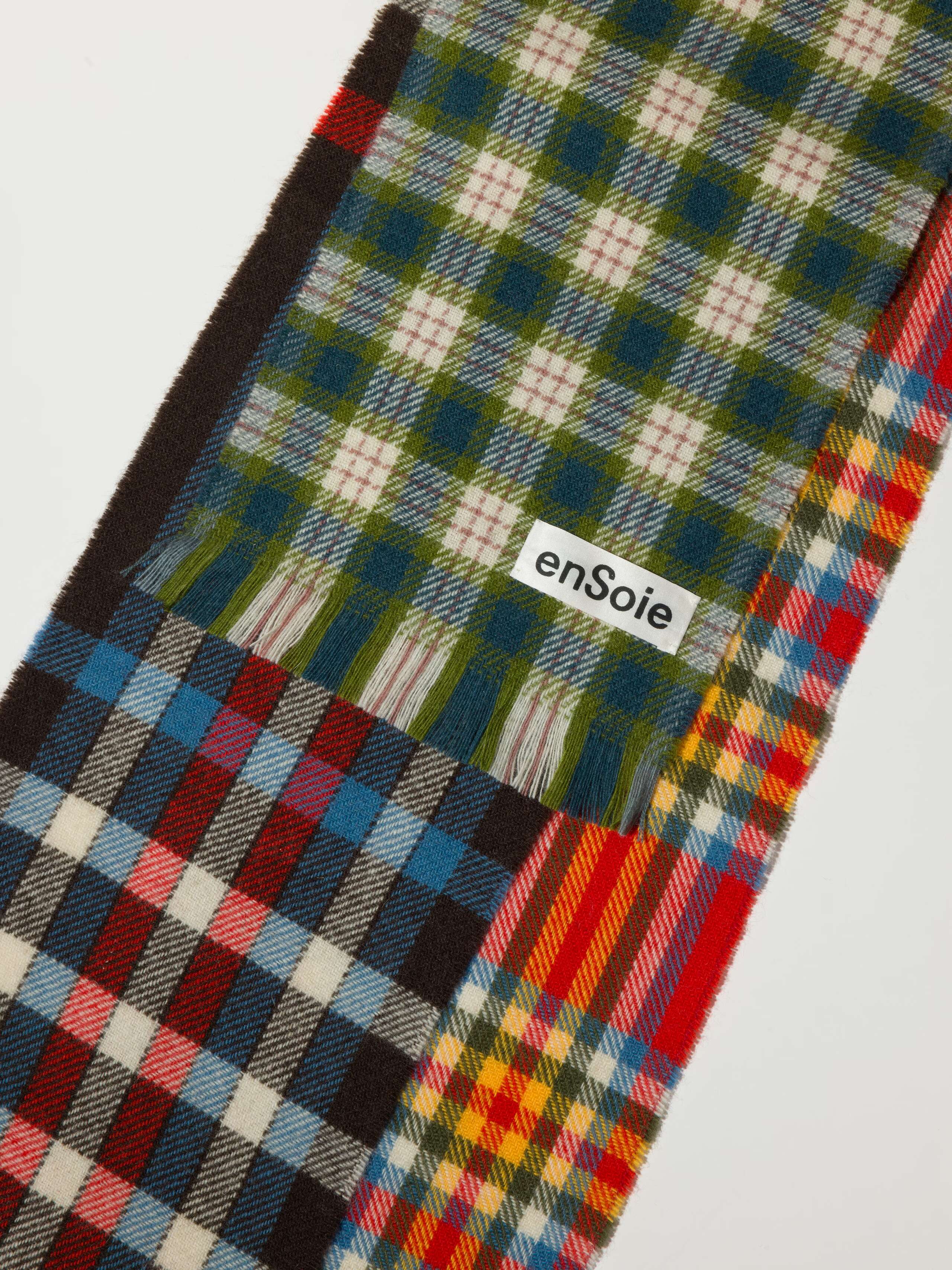 Picture of three colourful wool scarfs