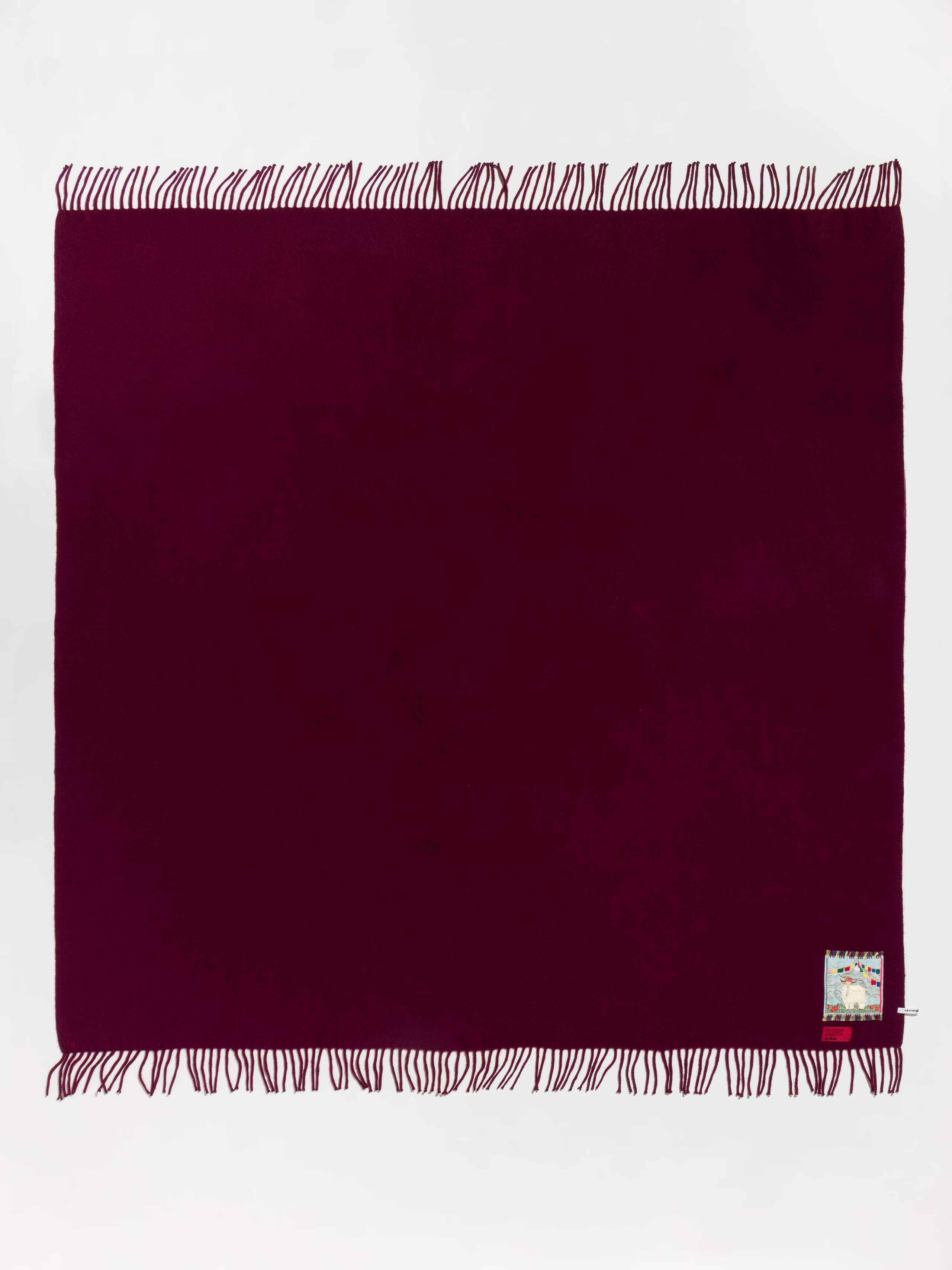 Picture of a warm burgundy cashmere stole