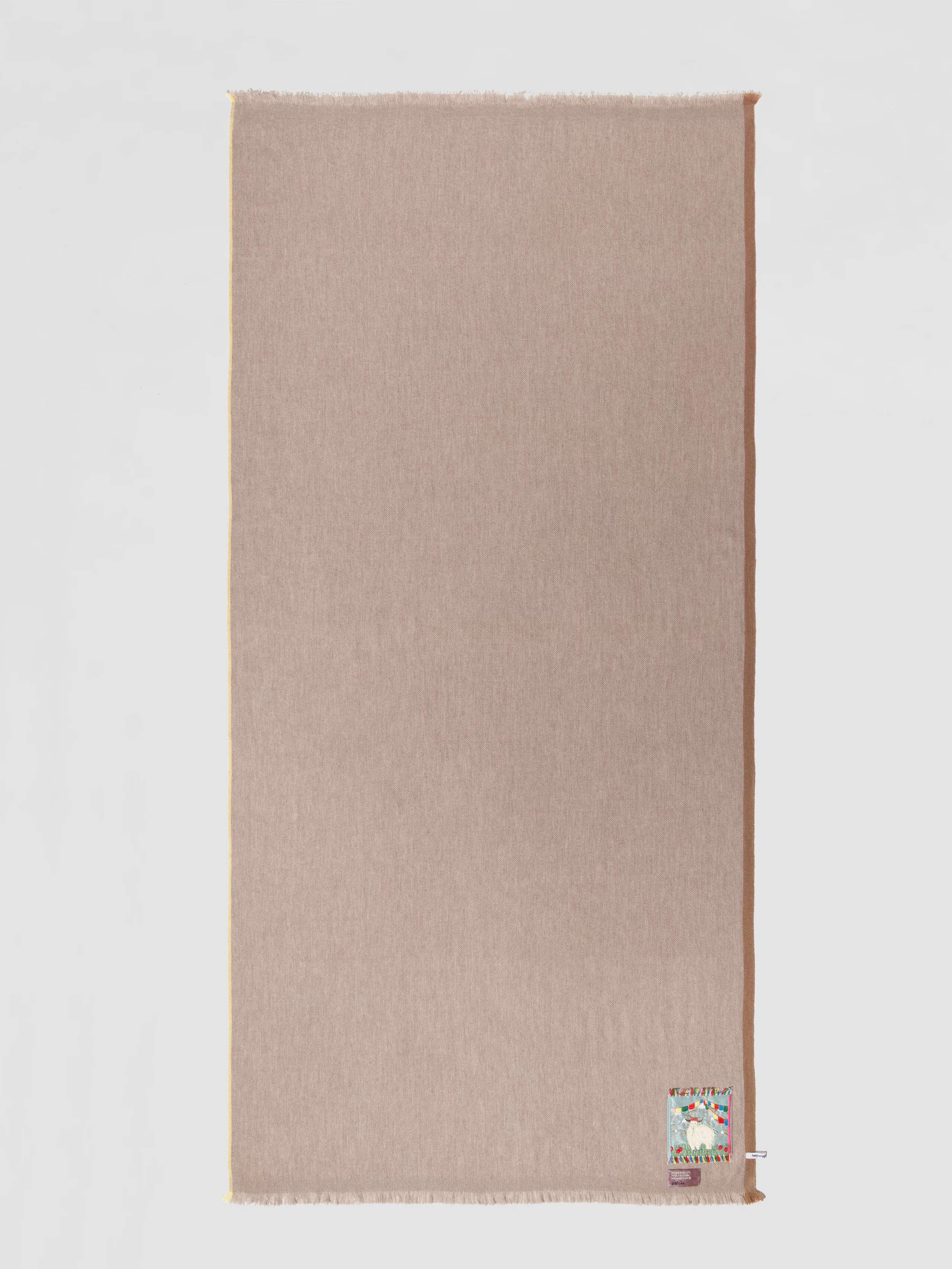 Picture of a beige cashmere scarf