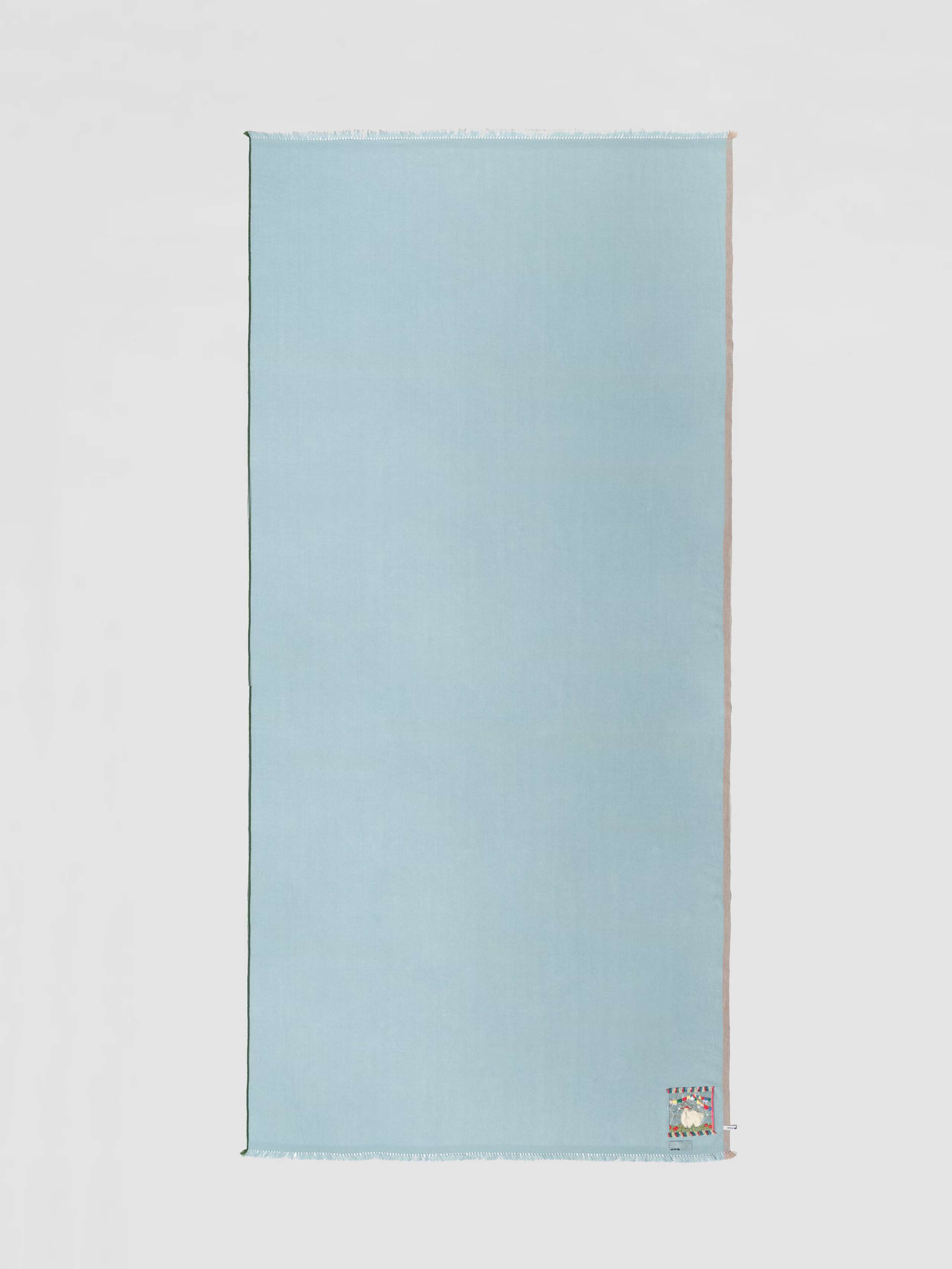 Picture of a light blue cashmere scarf