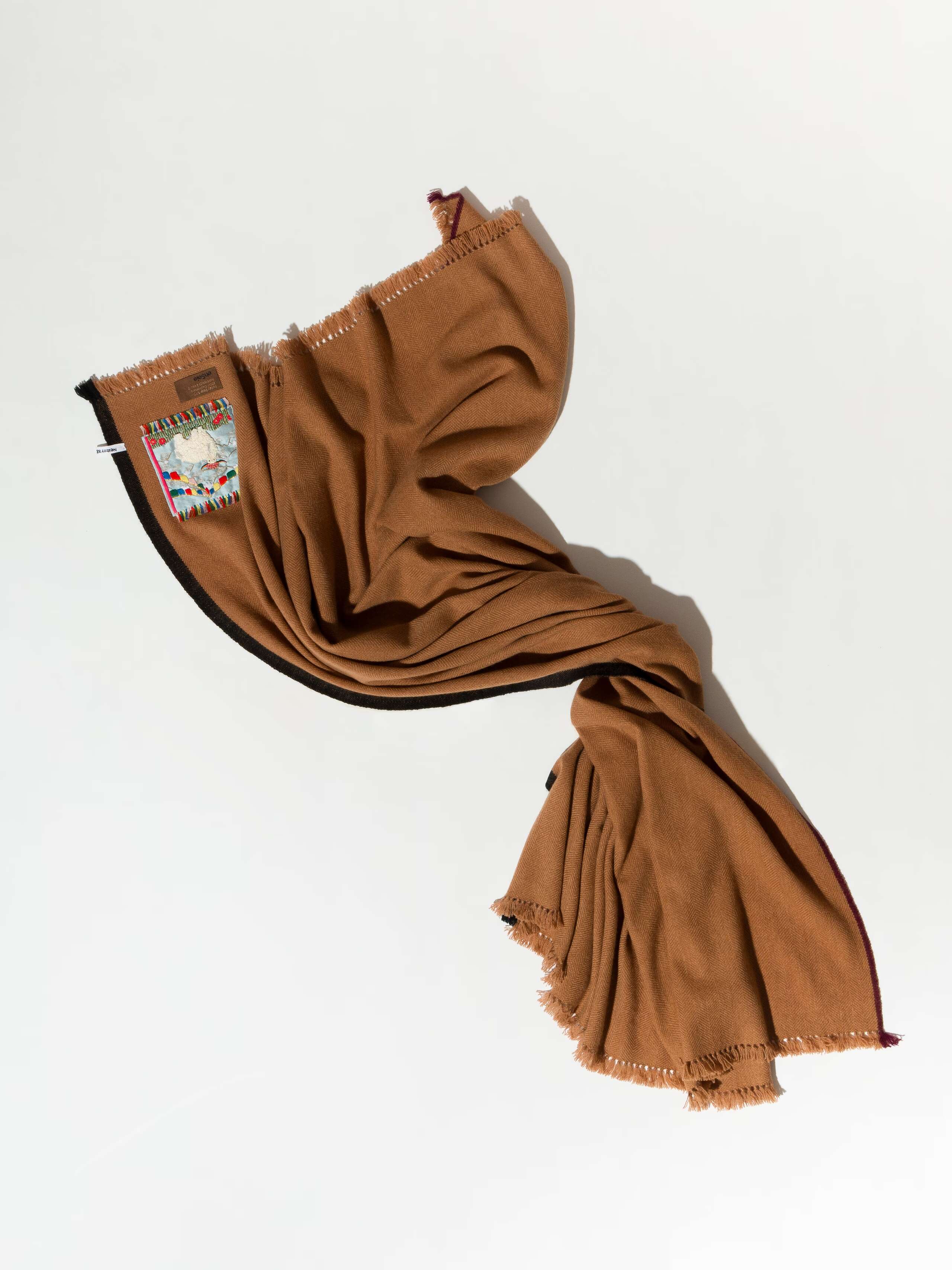 Picture of a beautiful cashmere scarf in a warm brown shade