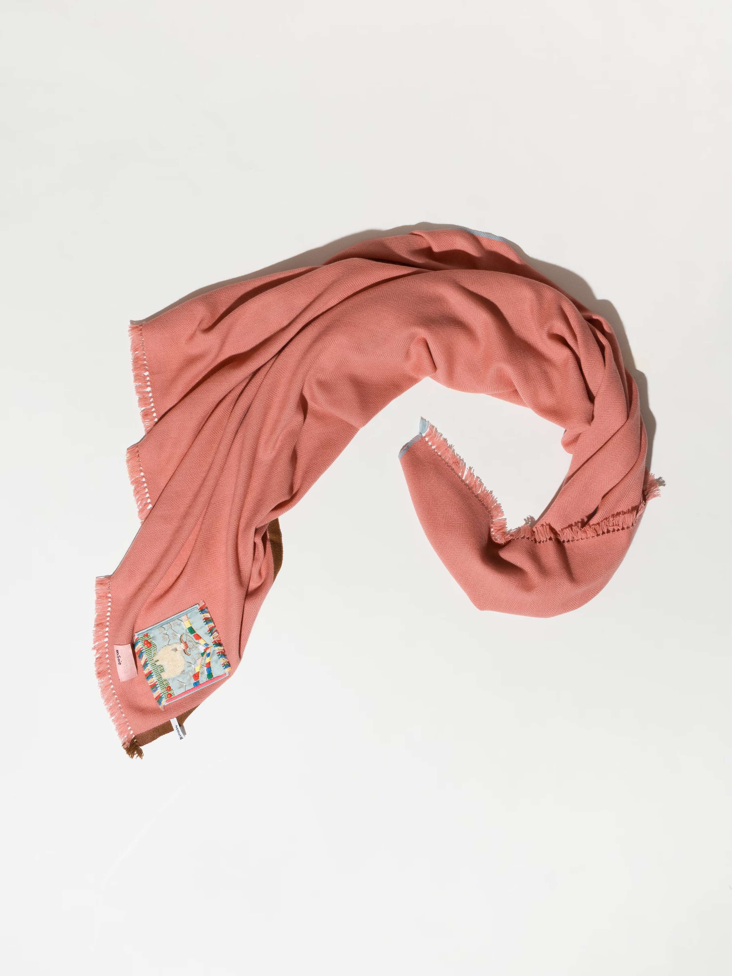 Picture of a beautiful cashmere scarf in a warm pink shade