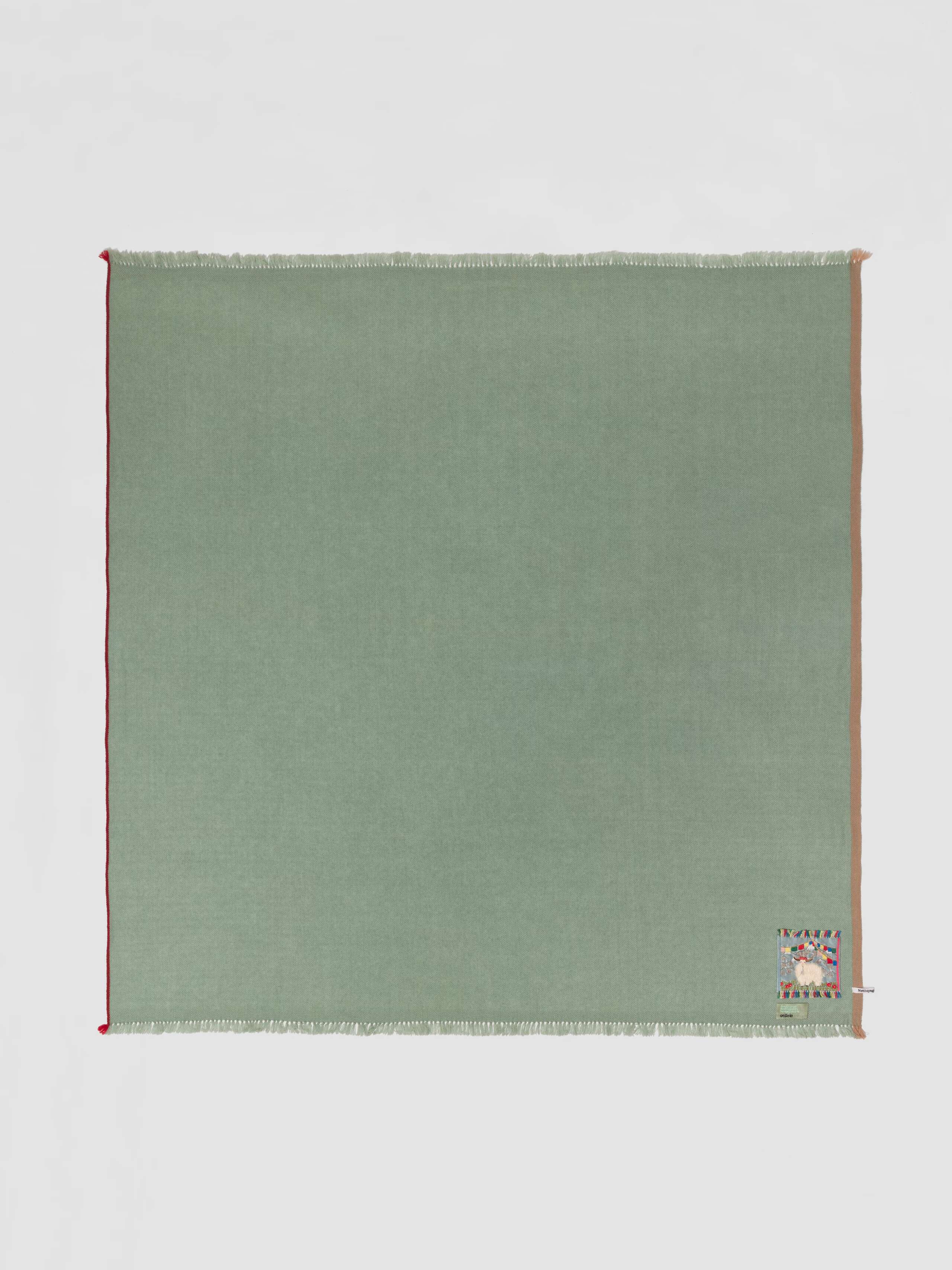 Picture of a light green blue cashmere stole
