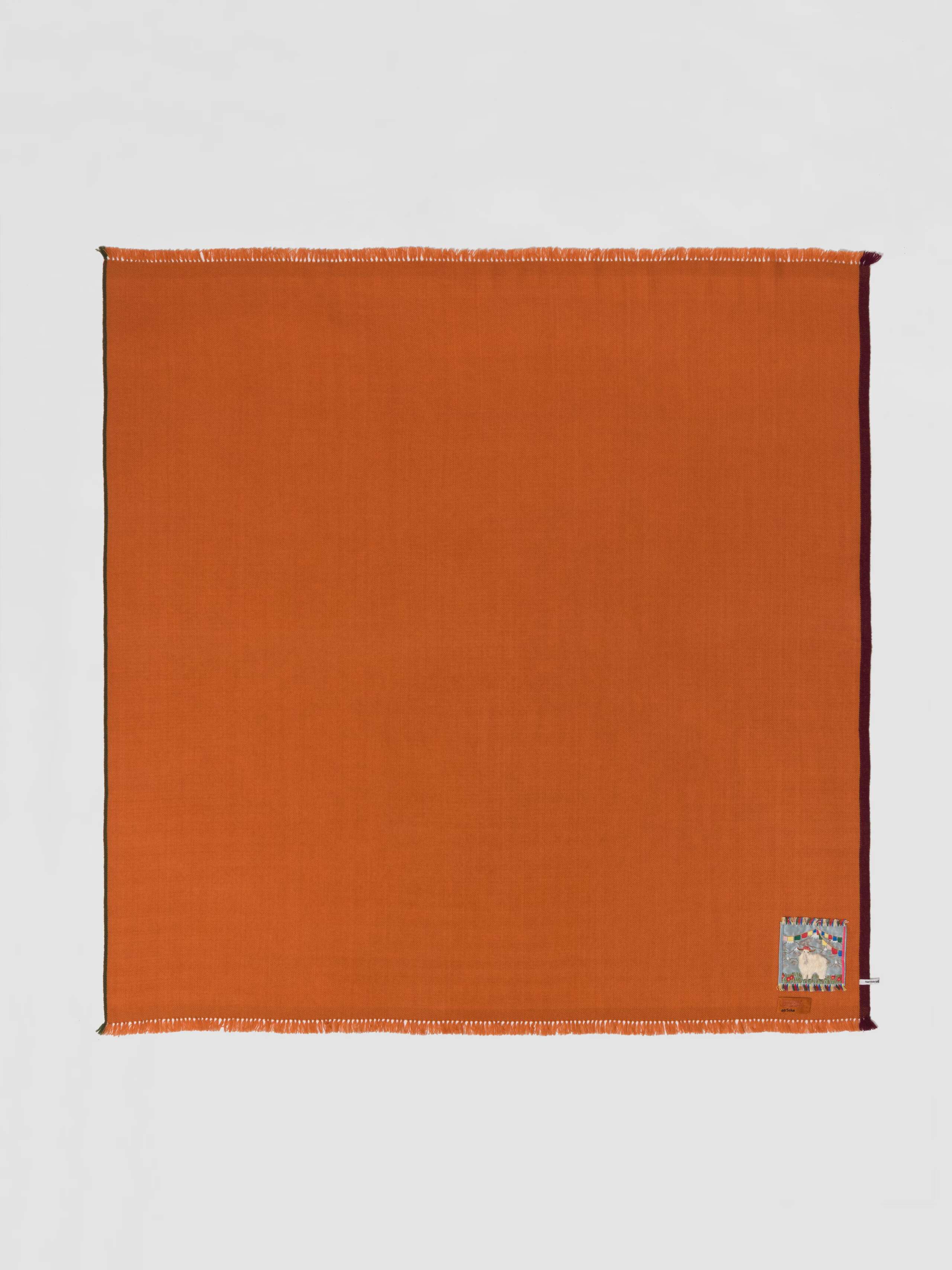 Picture of a warm orange cashmere stole