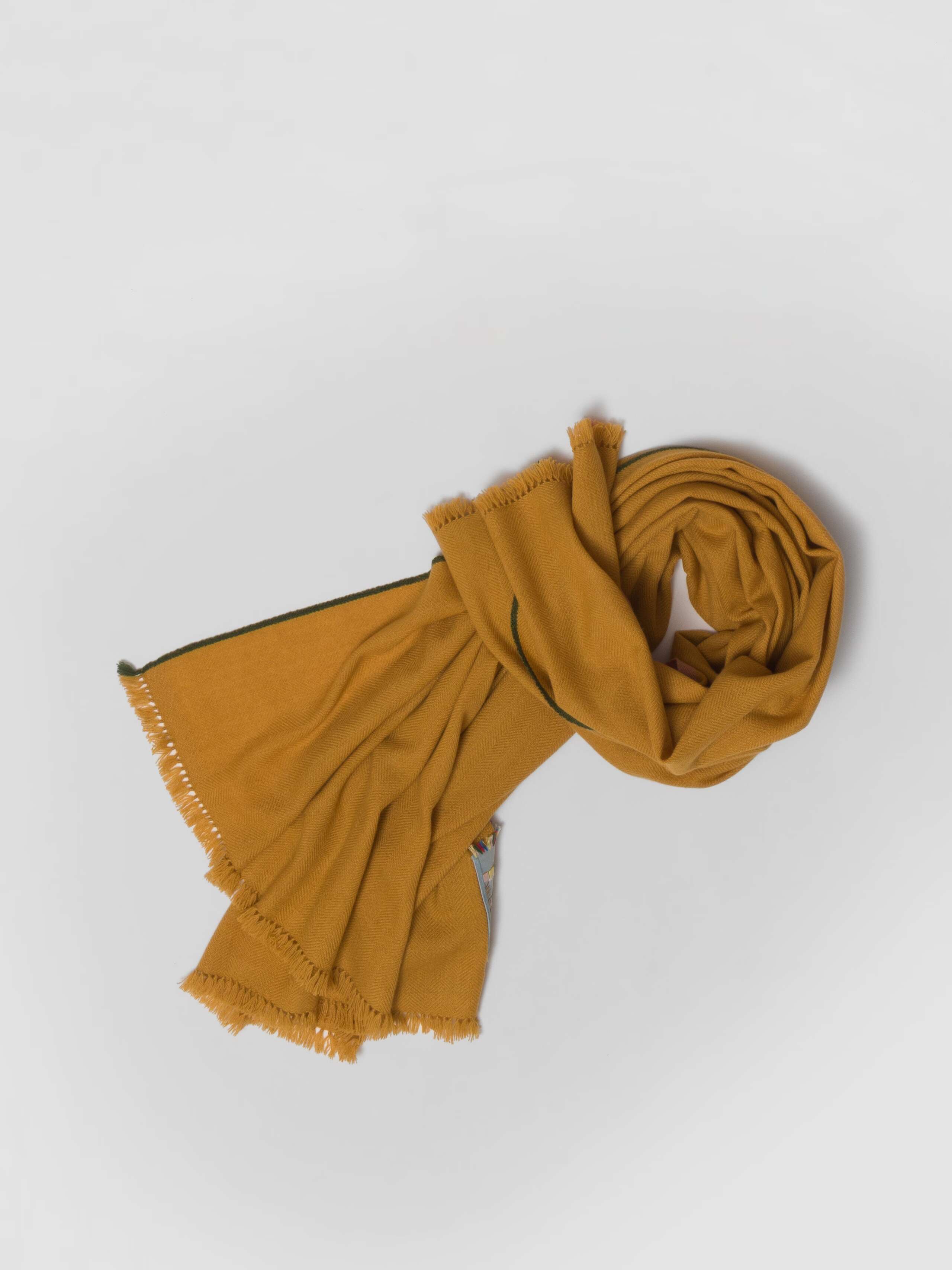Picture of a warm yellow cashmere scarf