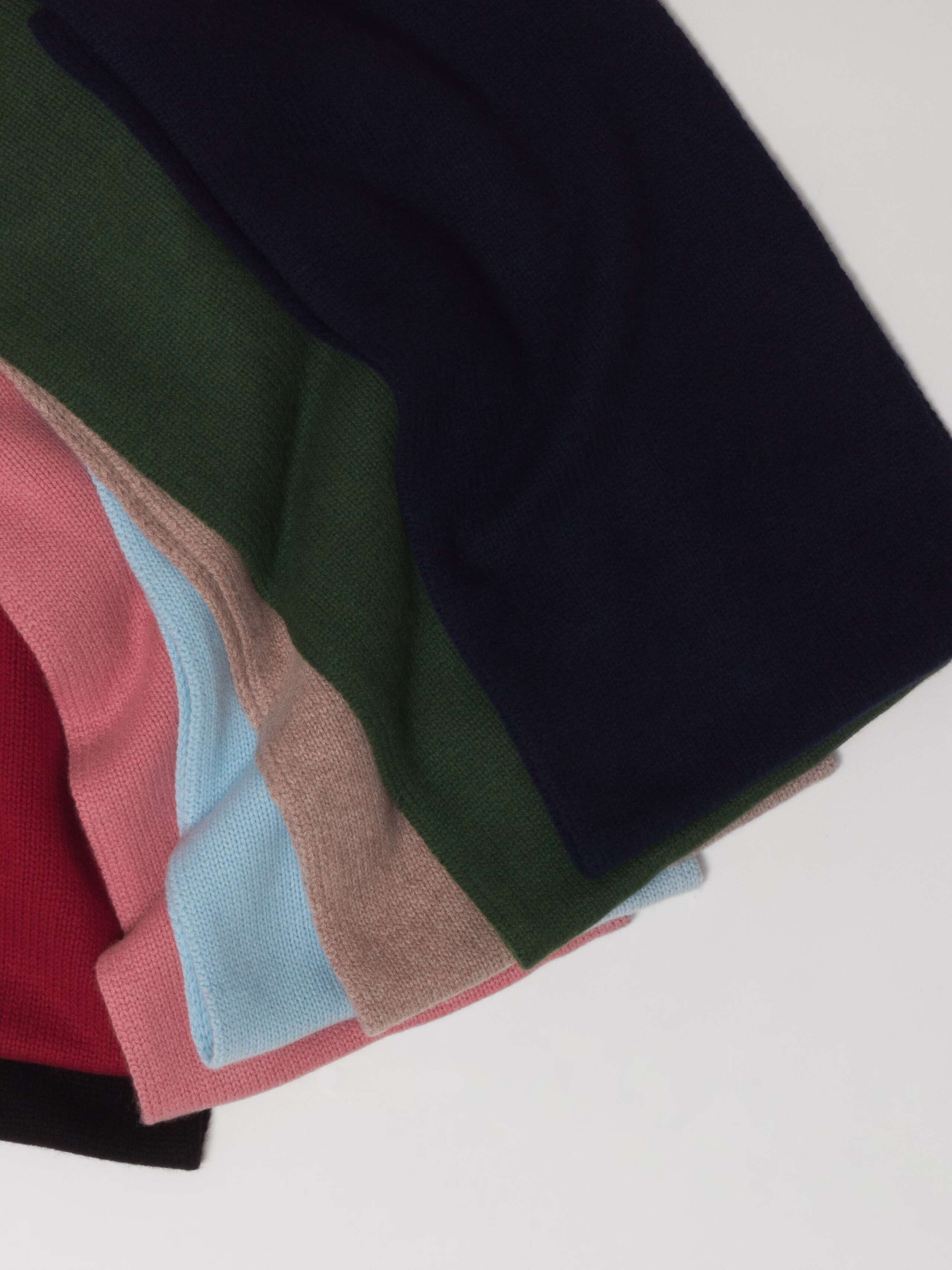 Picture of seven colourful cashmere scarfs