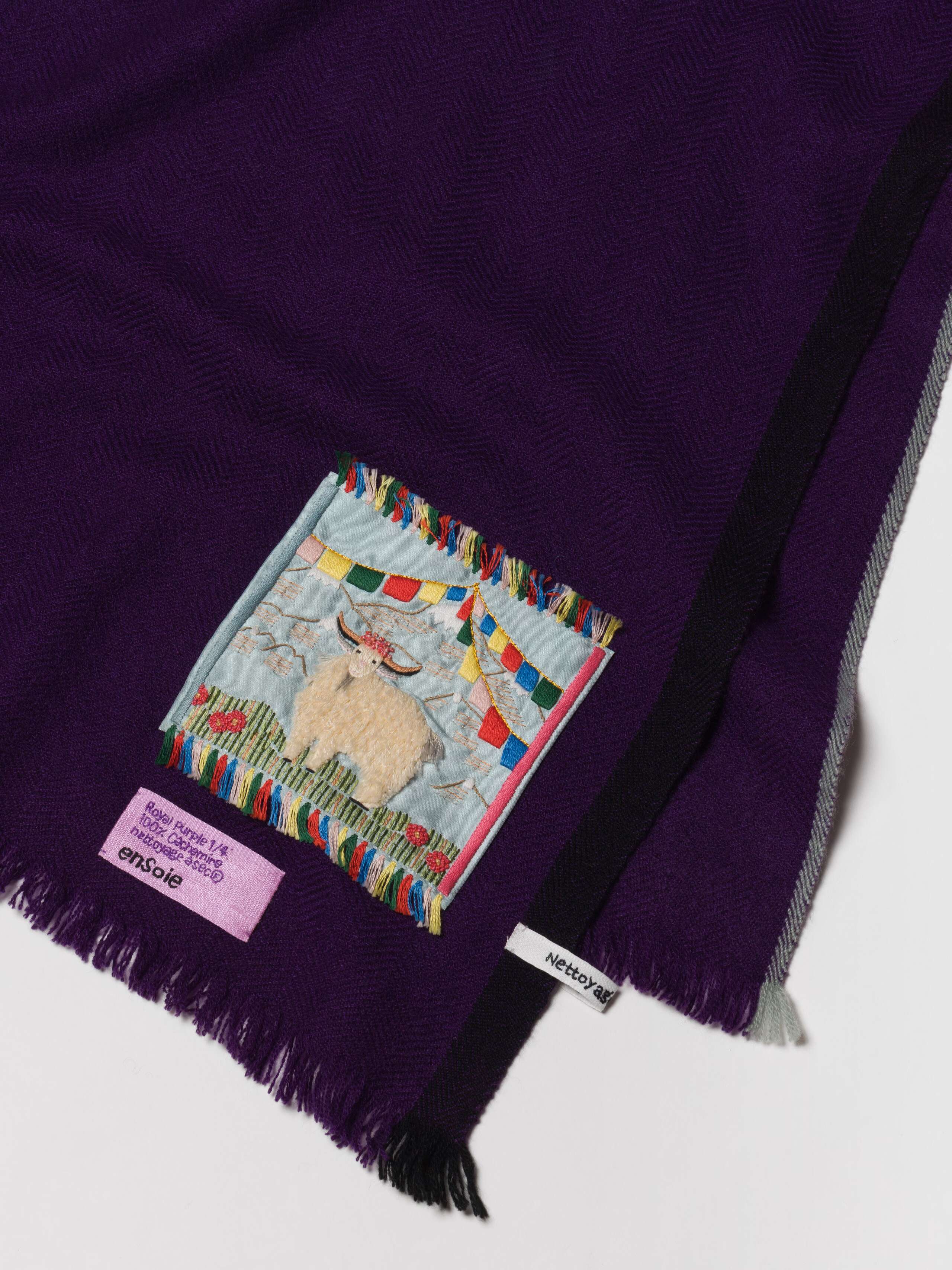 Picture of a beautiful cashmere stole in a deep purple shade